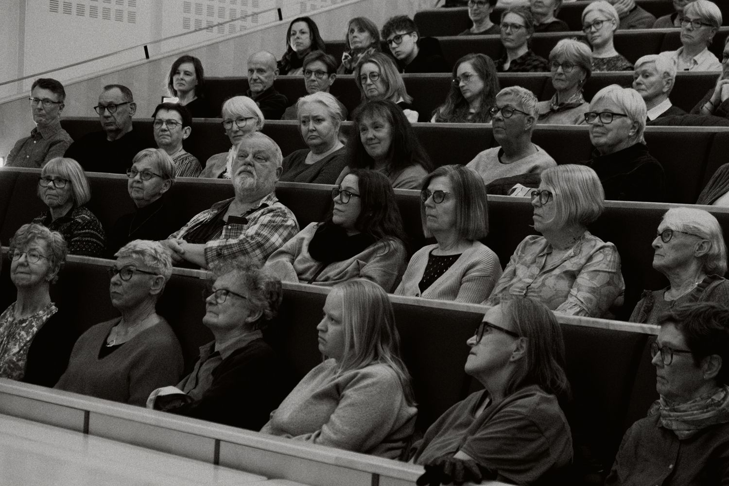 Black and white photograph of an audience
